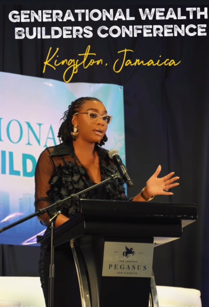 Krystal hosting the Generational Wealth Builders Conference in Kingston, Jamaica.